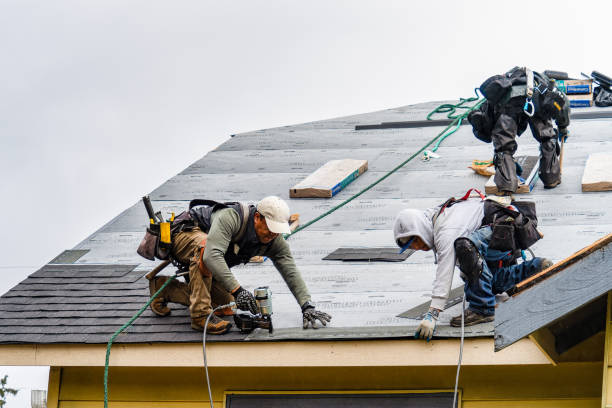 Professional Roofing technician working in York Beach, ME